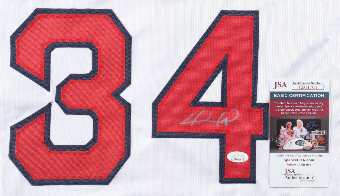 The Sports Integrity David Ortiz Boston Signed White Baseball Jersey features red and navy blue number 34 with a silver autograph on the 4, plus a JSA authentication card included.