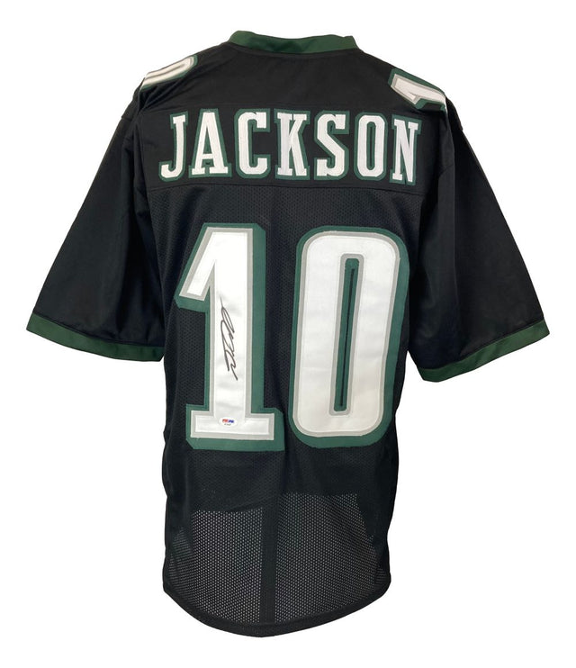 A black DeSean Jackson Philadelphia football jersey by Sports Integrity with green and white accents, number 10, "JACKSON" on the back, and a signed number 1. Comes with PSA/DNA hologram.