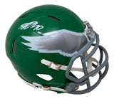 The Sports Integrity DeSean Jackson Signed Philadelphia Eagles Kelly Green Mini Speed Helmet features a silver eagle wing logo, gray facemask, white chinstrap, and DeSean Jackson's autograph on top.