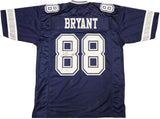 The Sports Integrity Dez Bryant Dallas Signed Navy Blue Football Jersey BAS ITP features white sleeve stripes, "BRYANT" and number 88 on the back, plus Dez Bryant's signature beside the number.
