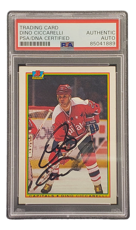 The Sports Integrity Dino Ciccarelli Signed 1990 Bowman #69 Washington Capitals Hockey Card comes PSA/DNA authenticated in a labeled slab.