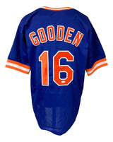 The Sports Integrity Dwight Doc Gooden New York Signed Blue Baseball Jersey JSA features "GOODEN" and number 16 on the back, with a signature on the number 6. The jersey is blue with orange and white trim.