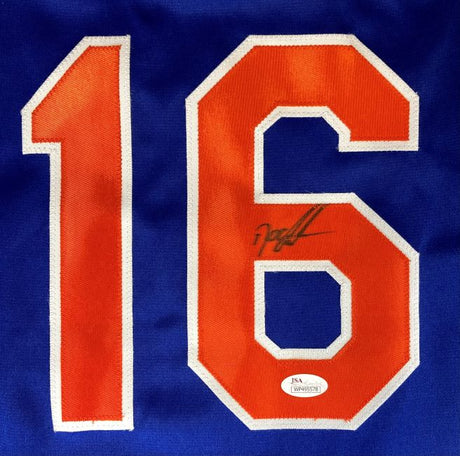 The Sports Integrity Dwight Doc Gooden New York blue baseball jersey features large orange and white number 16, with the number 6 signed in black ink and a JSA authentication sticker at the bottom.