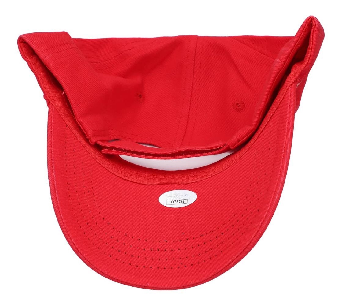 The President Donald Trump Signed 2024 Take America Back Adjustable Hat by Sports Integrity is shown upside down, revealing the inside crown and brim, with a white oval label visible on the underside of the brim.