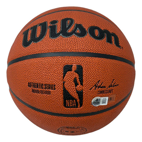 A Julius Dr. J Erving Philadelphia 76ers Signed Wilson I/O Basketball by Sports Integrity, featuring black text, logos, a pebbled orange and black surface with the NBA logo, suitable for indoor and outdoor use.