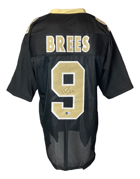 Sports Integrity Drew Brees New Orleans Signed Black Football Jersey BAS featuring gold and white details, with "BREES" and the number 9 on the back.