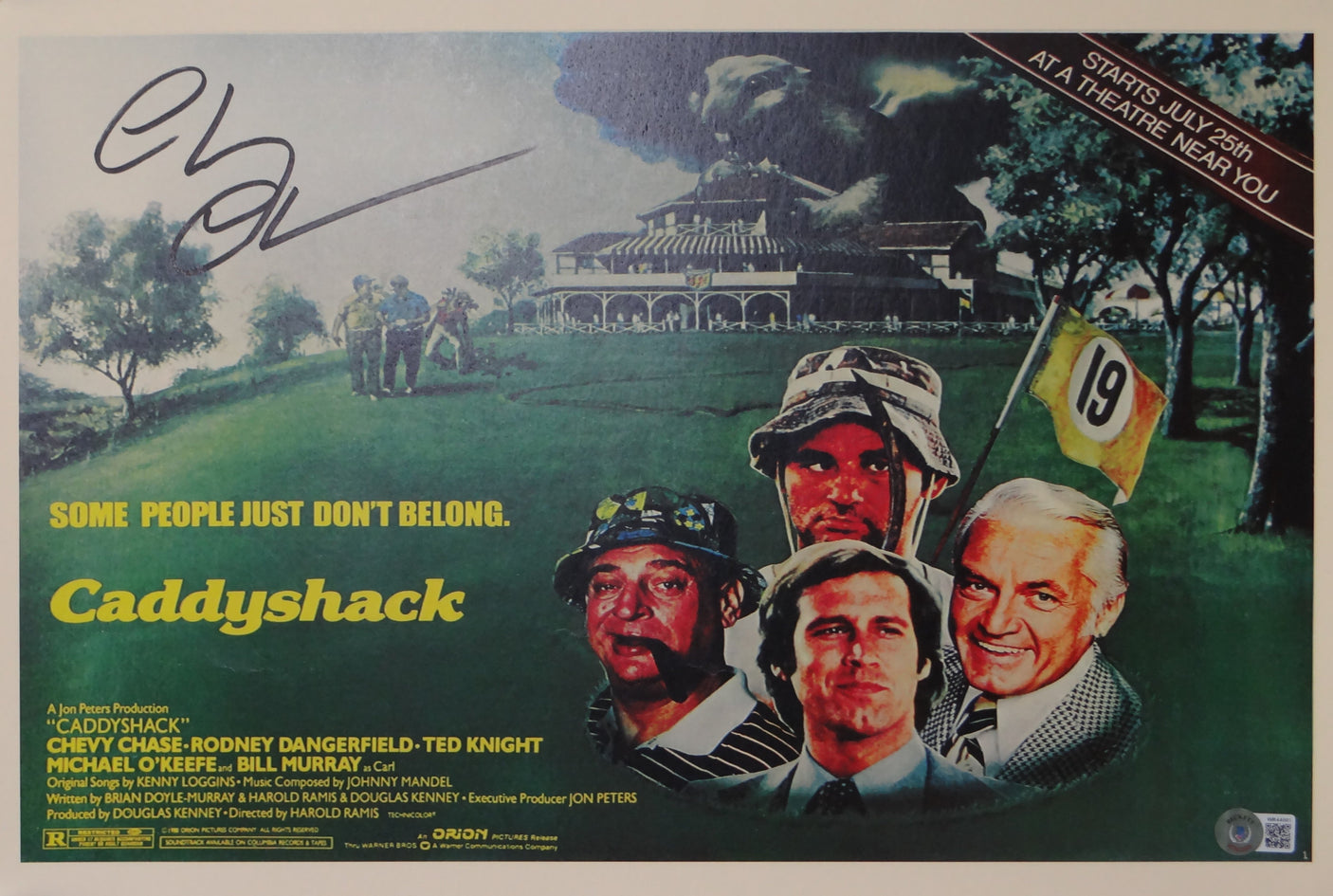 Chevy Chase Autographed 11x17 Caddyshack Movie Poster - Beckett Holo