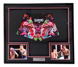 Sports Integrity offers a framed display featuring Dustin Poirier signed custom MMA fight trunks (PSA/DNA), with action photos and a nameplate reading "Dustin Poirier UFC Lightweight.