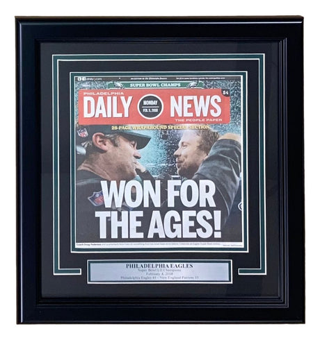 The Sports Integrity Super Bowl LII (52) Philadelphia Eagles Framed Champions Full Daily News Newspaper features the historic "WON FOR THE AGES!" cover with two celebrating fans and a plaque reading "PHILADELPHIA EAGLES Super Bowl LII Champions.