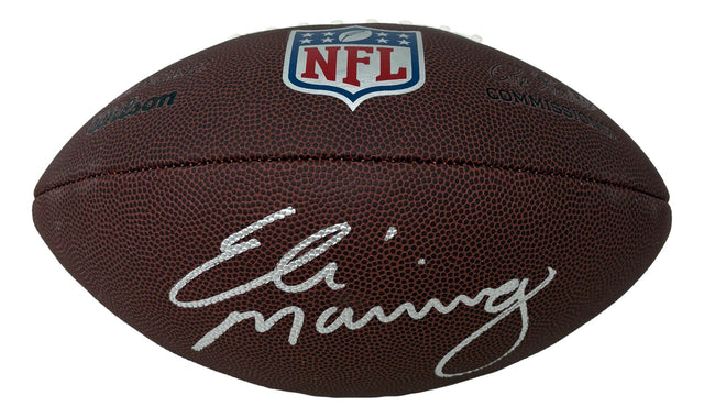 The Sports Integrity Eli Manning New York Giants Signed Full Size Replica NFL Duke Football features a brown design, the NFL logo above Eli Manning’s white signature on the side.