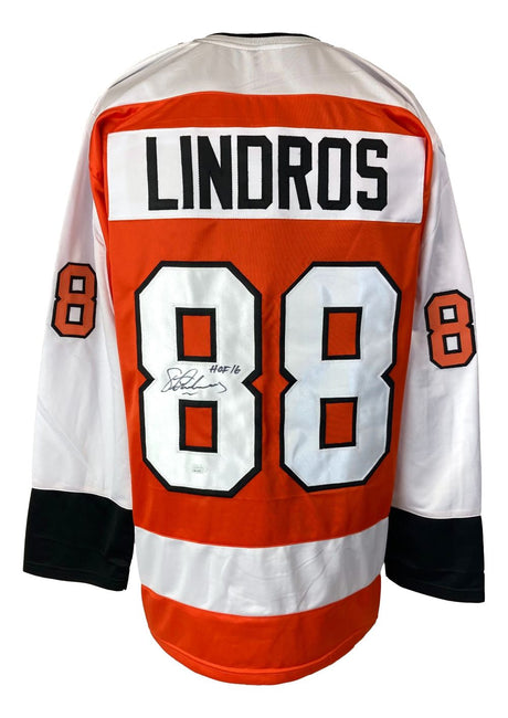 Sports Integrity Eric Lindros Philadelphia Flyers orange hockey jersey, signed with "HOF 16" inscription (JSA ITP), featuring the number 88 and Flyers colors: black, orange, and white.