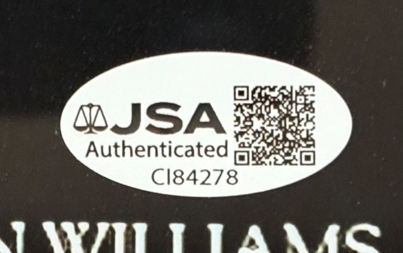 Sports Integrity’s ET Cast (4) Signed Framed 11x17 ET Photo Henry Thomas De Merritt & More features a JSA Authenticated oval sticker with a QR code, JSA logo, and code CI84278; partial white text visible at the bottom.