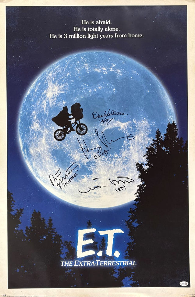 The Sports Integrity ET Cast (4) Signed 24x36 ET Poster features Henry Thomas, Matthew De Merritt & more. It shows a boy and E.T. flying on a bike across the moon, with multiple signatures and the movie title below. Authenticated by JSA.