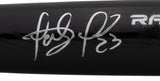 A close-up of a Fernando Tatis Jr. San Diego Padres Signed Black Rawlings Baseball Bat by Sports Integrity—an outstanding sports collectible featuring his autograph and number 23, authenticated by BAS.