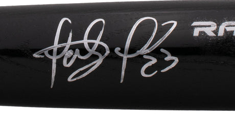 A close-up of a Fernando Tatis Jr. San Diego Padres Signed Black Rawlings Baseball Bat by Sports Integrity—an outstanding sports collectible featuring his autograph and number 23, authenticated by BAS.