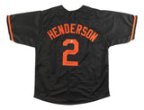 A black Gunnar Henderson Baltimore baseball jersey by Sports Integrity, featuring orange accents, his name and number 2 on the back signed and dated "23.2.14. HOF," commemorating his AL ROY award with BAS authentication.