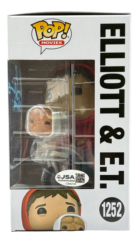 The Sports Integrity Henry Thomas Signed ET Funko Pop #1252 features Elliott and E.T. in a clear-front box with a JSA authentication sticker visible.