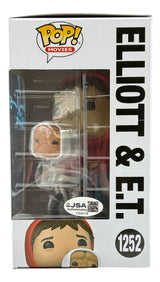 The Sports Integrity Henry Thomas Signed ET Funko Pop #1252 features Elliott and E.T. in a clear-front box with a JSA authentication sticker visible.