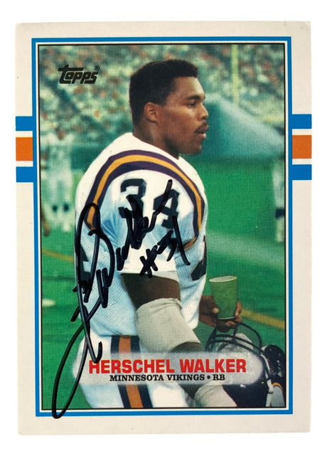 The Sports Integrity Herschel Walker Signed 1989 Topps #120T Minnesota Vikings Trading Card BAS features him in uniform as a running back, holding his helmet on the field, with his name and team shown.