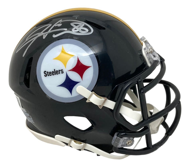 A Hines Ward signed Pittsburgh Steelers mini speed replica helmet by Sports Integrity, featuring the team logo, yellow stripe, faceguard, and white signature on top.
