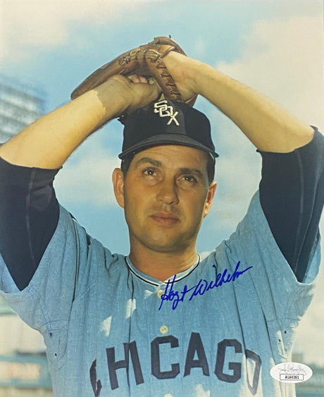 Hoyt Wilhelm is shown in a Chicago White Sox uniform with his glove raised above his head on this signed 8x10 photo. Authenticated by JSA (AL44261). Available from Sports Integrity.