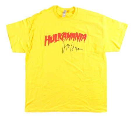 The Sports Integrity Hulk Hogan Signed WWE Hulkamania Yellow T-Shirt features bold red "HULKAMANIA" lettering and a black signature print from Hulk Hogan.