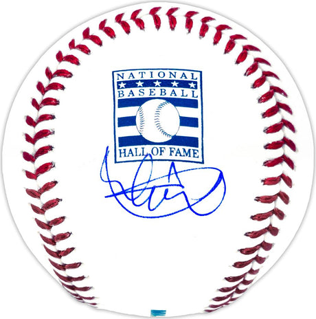 The Sports Integrity Ichiro Suzuki Seattle Mariners Signed Hall Of Fame Logo Baseball features a white ball with red stitching, a blue Hall of Fame logo, and Ichiro’s autograph in blue ink below the logo.