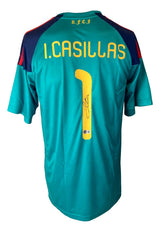 The Sports Integrity Iker Casillas Signed Spain Adidas Soccer Jersey BAS features teal and navy colors, yellow lettering, I. Casillas and number 1 on the back with his signature below, plus "R.F.E.F" printed on the upper back.