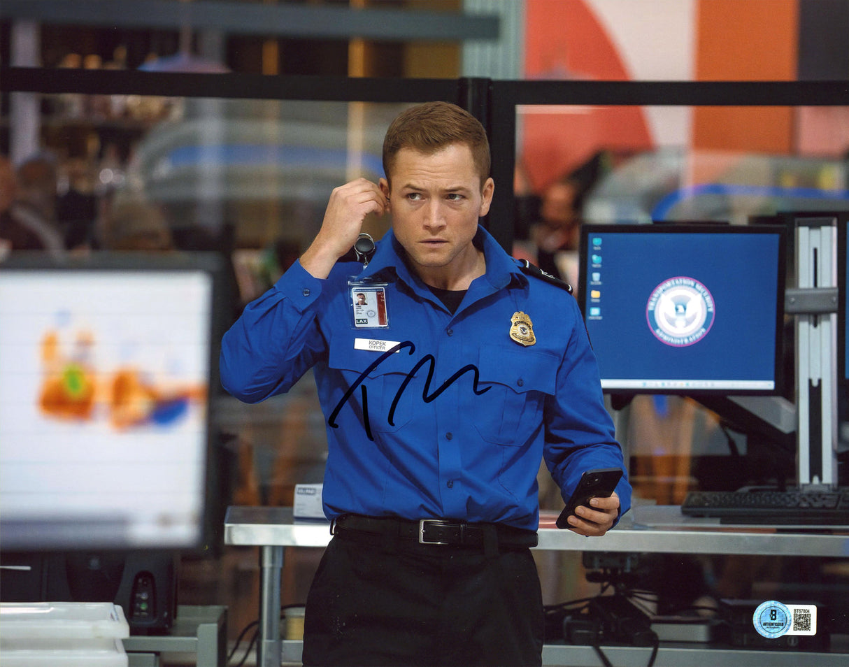 Taron Egerton Carry On Authentic Signed 11x14 Horizontal Photo BAS #BT67804