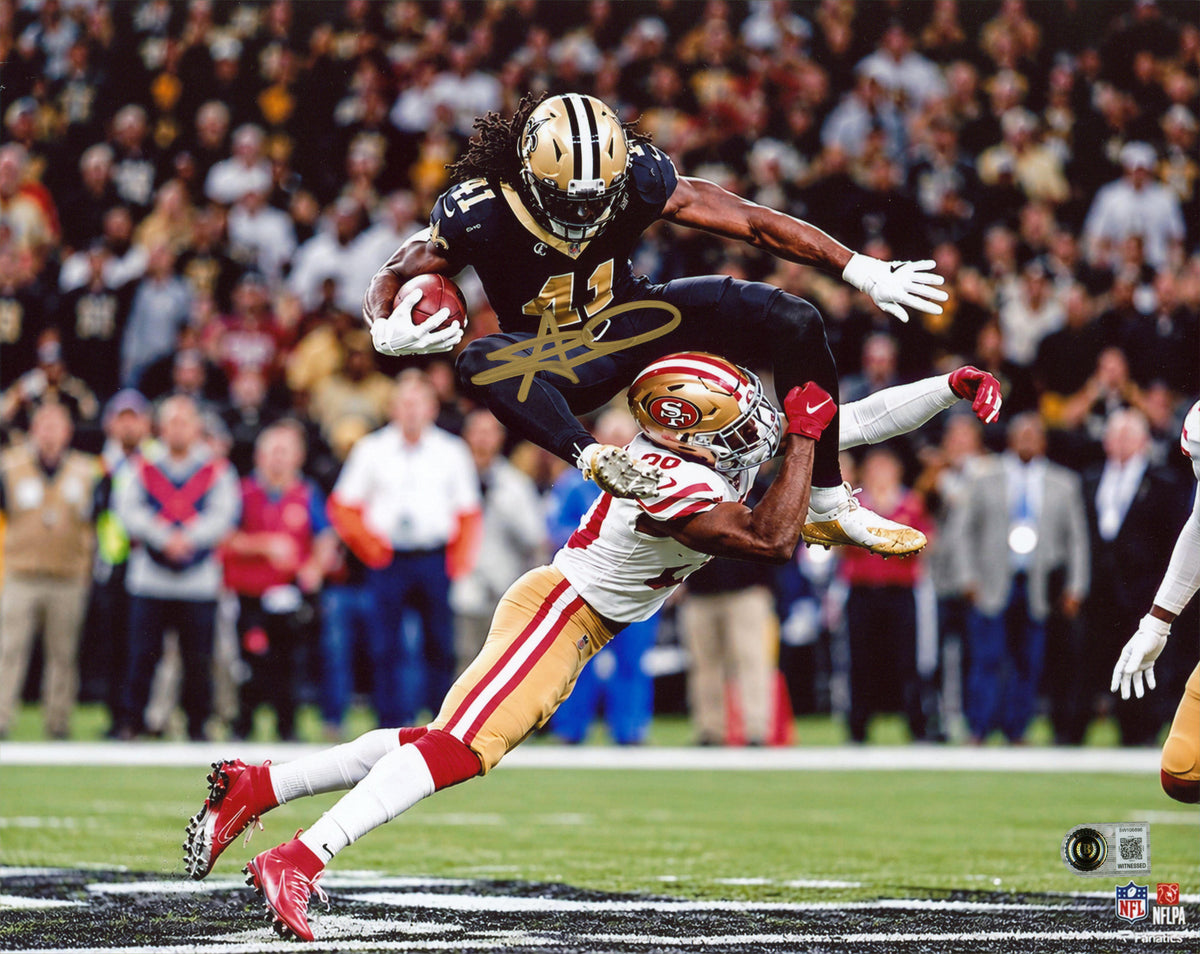 Saints Alvin Kamara Authentic Signed 11x14 Horizontal Hurdle Photo BAS Witnessed