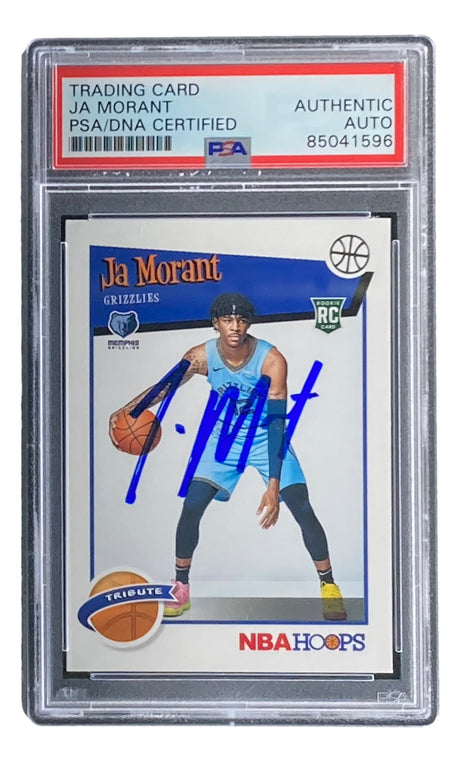 Ja Morant Signed 2019/20 Panini Hoops #297 Grizzlies Rookie Card by Sports Integrity, encased in PSA/DNA with label “TRADING CARD JA MORANT PSA/DNA CERTIFIED AUTHENTIC AUTO 85041596” and blue autograph on front.