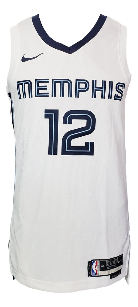 The Ja Morant Signed Memphis Grizzlies White Nike Swingman M Jersey by Sports Integrity features navy accents, large number 12 print, Nike logo on the right shoulder, and NBA logo patch near the bottom hem.