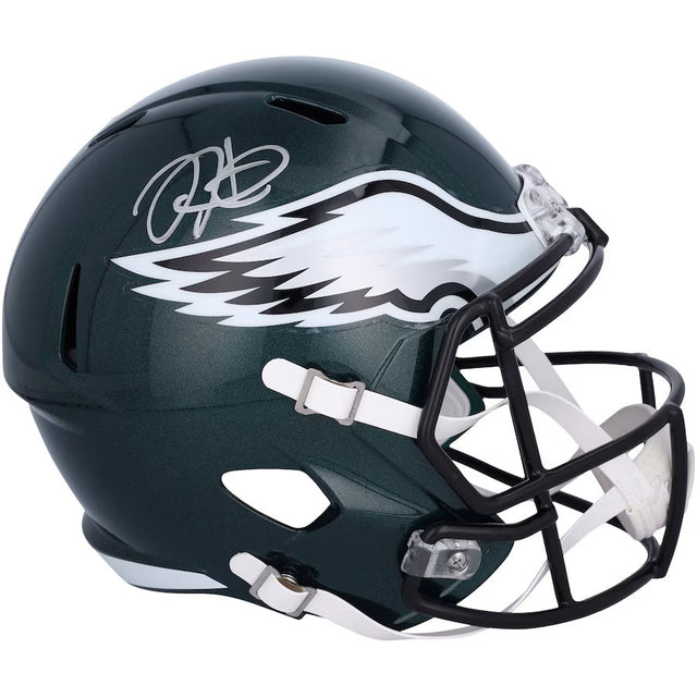 The Sports Integrity Jalen Hurts Signed Philadelphia Eagles Full Size Speed Replica Helmet features a dark green shell, white and silver eagle wing logo, silver autograph on top left, black facemask, and a white chin strap.