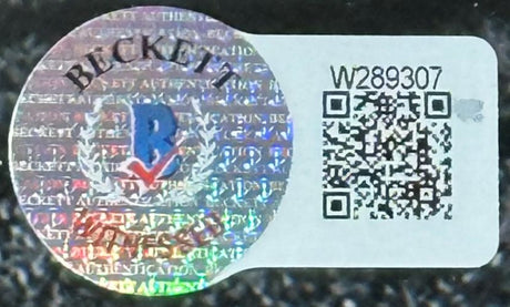 This Ja'Marr Chase Signed Framed 16x20 Cincinnati Bengals Spotlight Photo by Sports Integrity includes a Beckett authentication sticker featuring a holographic logo, unique serial number W289307, and a QR code on a white background.