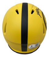 A James Harrison signed Pittsburgh Steelers Rave Mini Speed Helmet by Sports Integrity, featuring yellow color, black racing stripes, ventilation holes, a base sticker, and a signature on the upper right; back view shown.