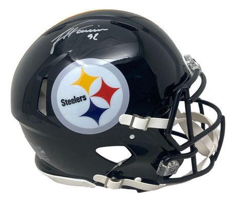 A James Harrison signed Pittsburgh Steelers full size authentic Speed helmet by Sports Integrity, featuring the team logo and a white autograph on top.