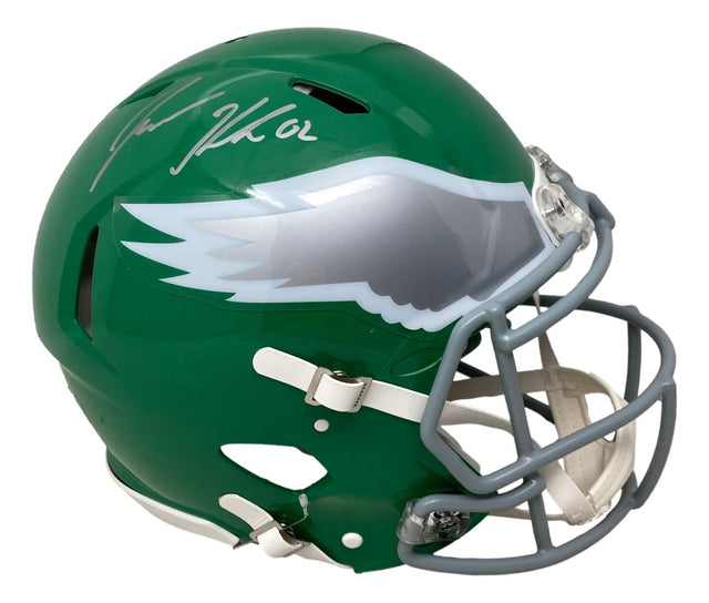 The Jason Kelce Signed Eagles FS Kelly Green Speed Authentic Helmet by Sports Integrity features a silver wing design, gray and white faceguard, and his signature in silver on top, authenticated with a PSA ITP hologram.