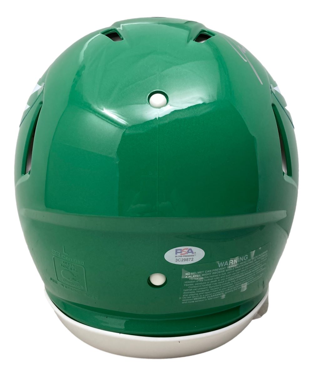 The Jason Kelce Signed Eagles FS Kelly Green Speed Authentic Helmet by Sports Integrity features rear ventilation holes, a white label with text, and a PSA ITP hologram sticker near the bottom edge.