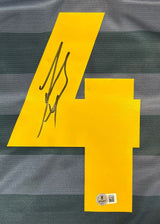 A Javier Zanetti signed Inter Milan blue Umbro soccer jersey by Sports Integrity features an autographed number 4 on a gray-striped background with a BAS authentication sticker and QR code on the lower right.