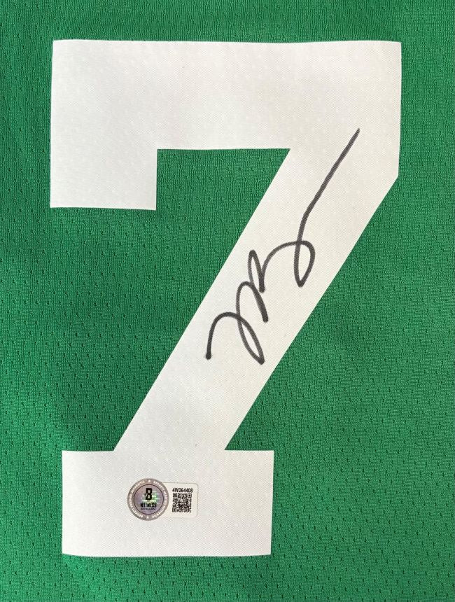 A large white number 7 is printed on this green Boston Celtics Nike Swingman Jersey, signed by Jaylen Brown in black ink with a BAS authenticity sticker featuring a QR code. Available from Sports Integrity.