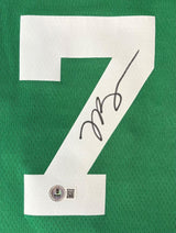 A large white number 7 is printed on this green Boston Celtics Nike Swingman Jersey, signed by Jaylen Brown in black ink with a BAS authenticity sticker featuring a QR code. Available from Sports Integrity.