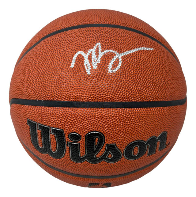 The Sports Integrity Jaylen Brown Boston Celtics Signed Wilson I/O Basketball features a white stylized signature on its textured orange surface with black lettering.