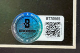 A Beckett hologram and QR code "BT70565" on this Sports Integrity Jeff Goldblum Signed Framed 8x10 Jurassic Park Photo verify the autograph’s authenticity.
