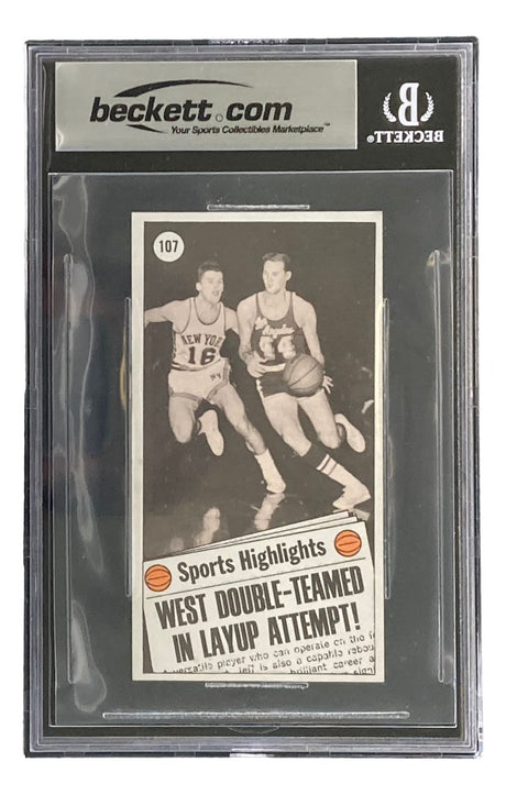 The Sports Integrity Jerry West Signed 1970-71 Topps #107 Lakers Trading Card BAS features West in action, double-teamed by a New York player, highlighting his skill on the court.