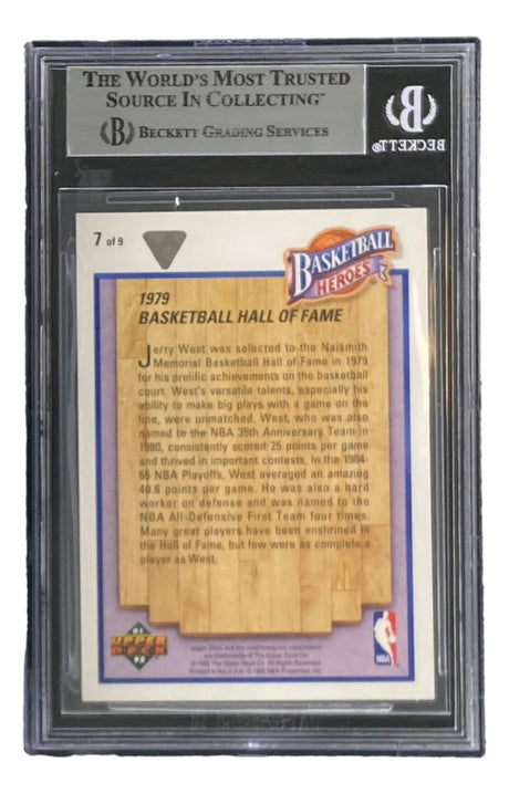 A Jerry West Signed 1991-92 UD Jerry West Heroes #7 Lakers Trading Card by Sports Integrity is Beckett-graded in a plastic case, featuring Hall of Fame details about Jerry West's career on the back and the Beckett logo at the top.