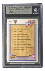 The Jerry West Signed 1991-92 UD Heroes #9 Lakers Trading Card by Sports Integrity is a graded, plastic-encased card featuring a Basketball Heroes checklist and listing Jerry West’s top achievements.