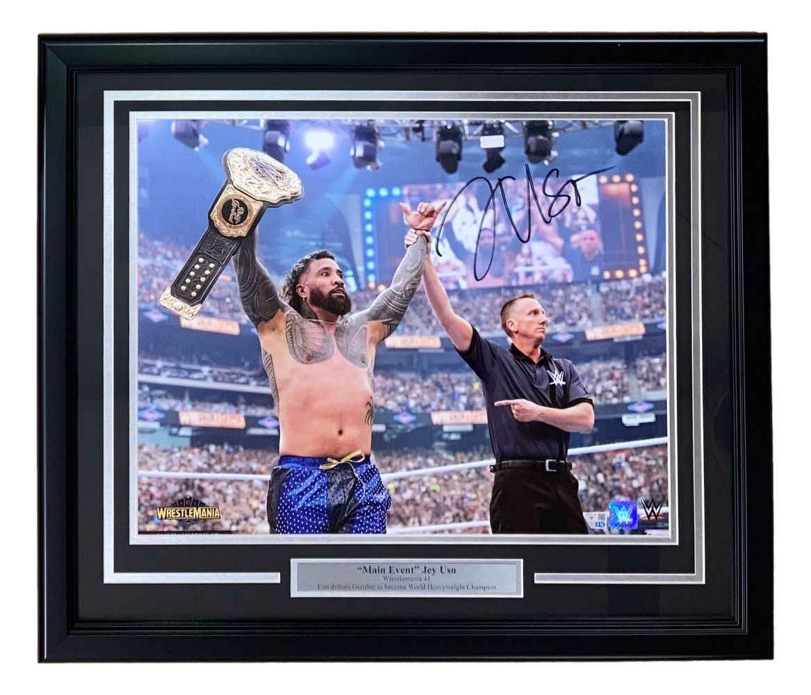 Sports Integrity Jey Uso Signed Framed 16x20 WWE Wrestlemania 41 Photo features an autographed image of Jey Uso with a championship belt and referee in front of fans, plus a “‘Main Event’ Jey Uso” plaque.