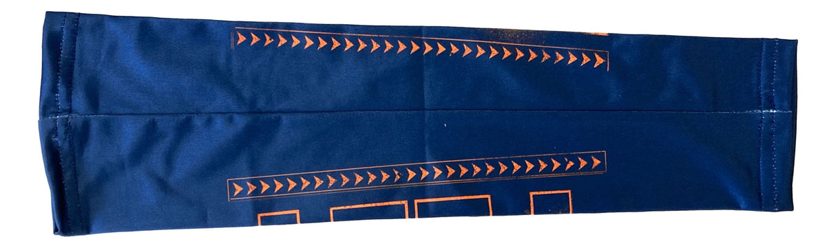 The Jey Uso Signed WWE Yeet Arm Sleeve by Sports Integrity is displayed horizontally against a plain white background, featuring dark blue fabric with orange geometric arrow and line patterns.