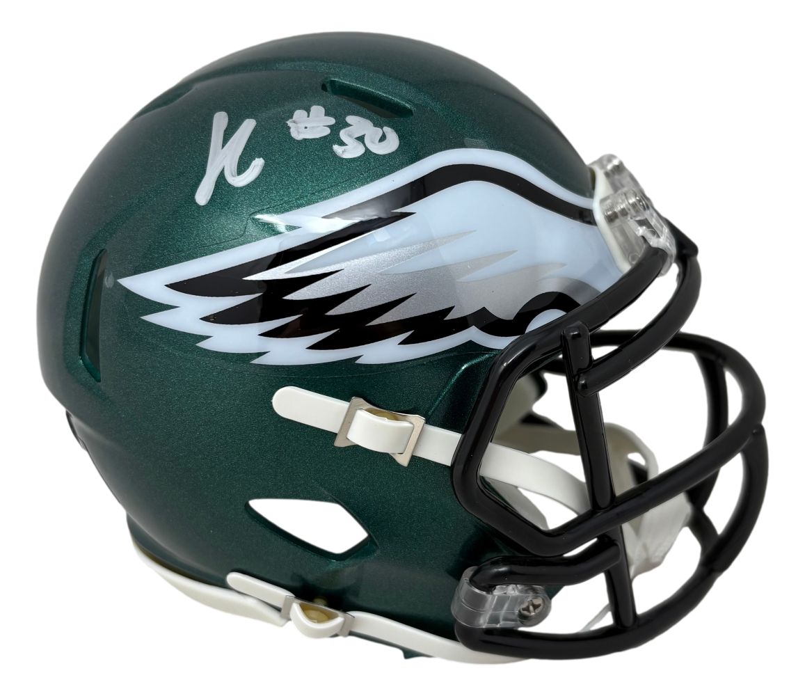 A Jihaad Campbell Signed Philadelphia Eagles Mini Speed Helmet by Sports Integrity features a green shell, large white eagle wing logo, and Campbell’s white signature with #30 on top.