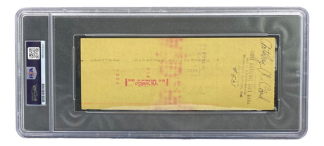 The Joe Frazier Boxing Signed Slabbed Bank Check #4557 by Sports Integrity is a yellow check with signatures and a red bank stamp, encased in a PSA/DNA holder featuring a barcode and QR code on the left side.